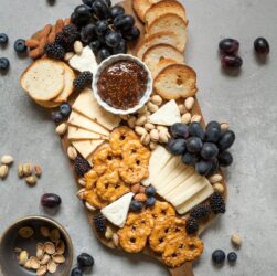 baked breads and cookies on brown wooden board